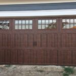 dark wood sprayed garage door with window