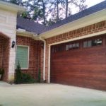 front door house with garage door