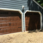 dark wood sprayed garage doors