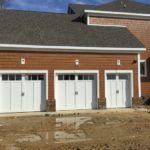 three separate garage doors small