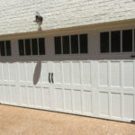 white garage doors with windows